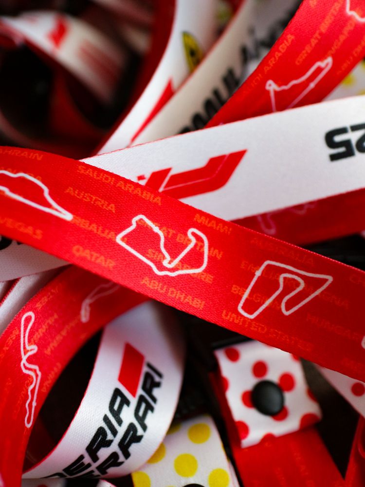 Ferrari HP Formula 1 Team Lanyard - Engineered for performance, Built for Style. A full sublimated lanyard equipped with Safety Clip, Buckle and Hook for convenience. Soft polyester material gentle to skin. Designed with love for Formula 1 fans.