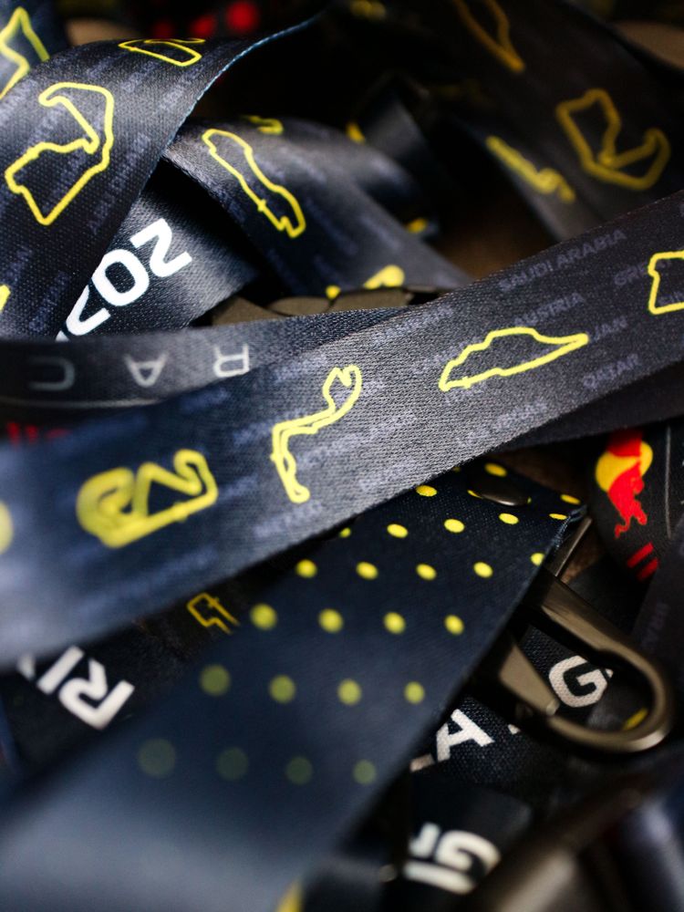 Oracle Redbull Racing Formula 1 Team Lanyard - Engineered for performance, Built for Style. A full sublimated lanyard equipped with Safety Clip, Buckle and Hook for convenience. Soft polyester material gentle to skin. Designed with love for Formula 1 fans.